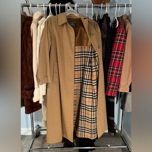 Long Burberry wool coat. Has a few spots and a small moth hole great condition